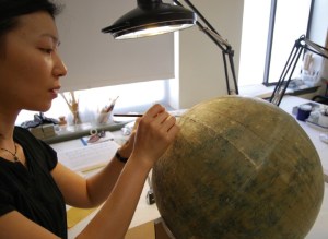 Conserving Einstein's Globe